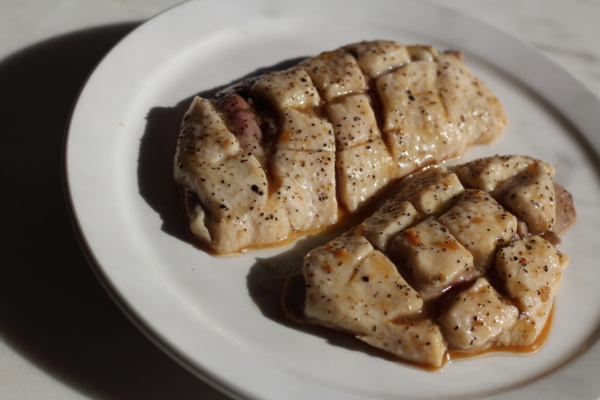 Score the fat of the duck breast with a checkered pattern.  Season with salt & pepper.