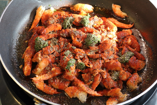 Place your Olive Oil in a pan.  Add you shrimp. Then add the minced Garlic, Smoked Paprika, chopped parsley and black pepper.